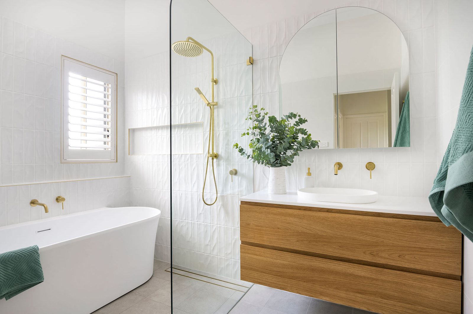 Bright bathroom with warm wood design reference